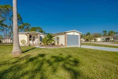 Move-in ready and beautifully furnished, this two-bedroom on Pine Lakes Country Club in Florida - for sale on GolfHomes.com, golf home, golf lot