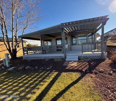 LOCATION, LOCATION, LOCATION!! This park model is a catch in the on Juniper Ridge R.V. Golf Resort in Arizona - for sale on GolfHomes.com, golf home, golf lot