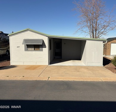 LOCATION, LOCATION, LOCATION!! This park model is a catch in the on Juniper Ridge R.V. Golf Resort in Arizona - for sale on GolfHomes.com, golf home, golf lot