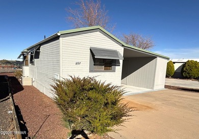 LOCATION, LOCATION, LOCATION!! This park model is a catch in the on Juniper Ridge R.V. Golf Resort in Arizona - for sale on GolfHomes.com, golf home, golf lot