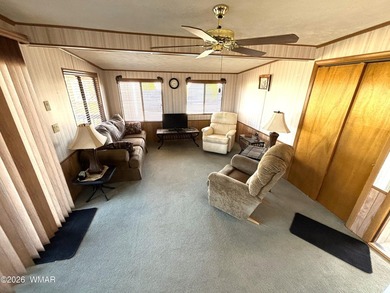 LOCATION, LOCATION, LOCATION!! This park model is a catch in the on Juniper Ridge R.V. Golf Resort in Arizona - for sale on GolfHomes.com, golf home, golf lot