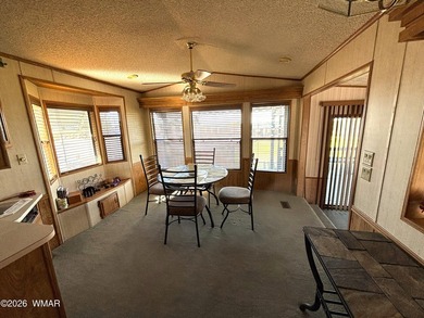 LOCATION, LOCATION, LOCATION!! This park model is a catch in the on Juniper Ridge R.V. Golf Resort in Arizona - for sale on GolfHomes.com, golf home, golf lot