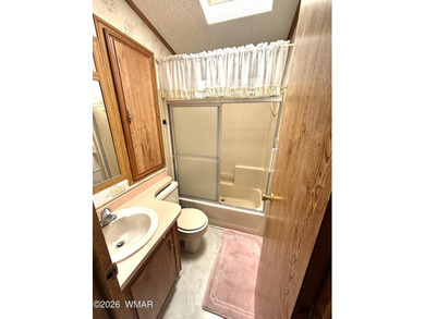 LOCATION, LOCATION, LOCATION!! This park model is a catch in the on Juniper Ridge R.V. Golf Resort in Arizona - for sale on GolfHomes.com, golf home, golf lot