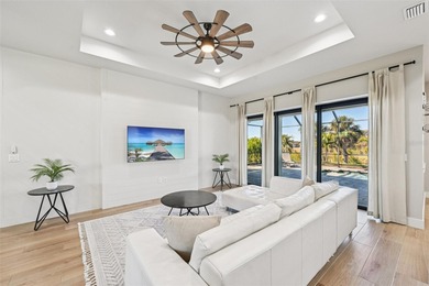 Sunsets, pond and golf course views become part of everyday life on Pinemoor West Golf Club in Florida - for sale on GolfHomes.com, golf home, golf lot