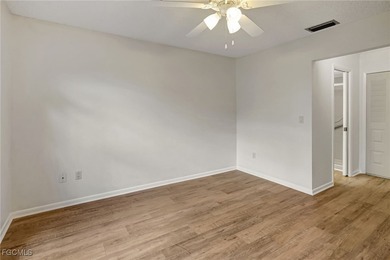 Welcome to this light-filled 2-bedroom, 2-bath end-unit villa in on Myerlee Country Club in Florida - for sale on GolfHomes.com, golf home, golf lot