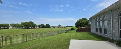 Meticulously maintained and perfectly situated on the 16th green on Ridgeview Ranch Golf Club in Texas - for sale on GolfHomes.com, golf home, golf lot
