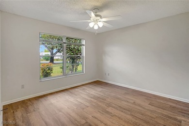 Welcome to this light-filled 2-bedroom, 2-bath end-unit villa in on Myerlee Country Club in Florida - for sale on GolfHomes.com, golf home, golf lot