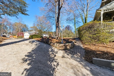 Tucked into the heart of Peachtree City, this home has been on Canongate At Flat Creek Club in Georgia - for sale on GolfHomes.com, golf home, golf lot