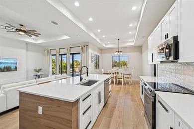 Sunsets, pond and golf course views become part of everyday life on Pinemoor West Golf Club in Florida - for sale on GolfHomes.com, golf home, golf lot