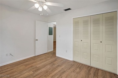 Welcome to this light-filled 2-bedroom, 2-bath end-unit villa in on Myerlee Country Club in Florida - for sale on GolfHomes.com, golf home, golf lot