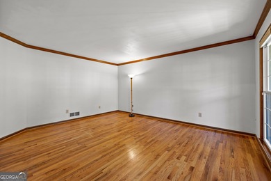 Tucked into the heart of Peachtree City, this home has been on Canongate At Flat Creek Club in Georgia - for sale on GolfHomes.com, golf home, golf lot