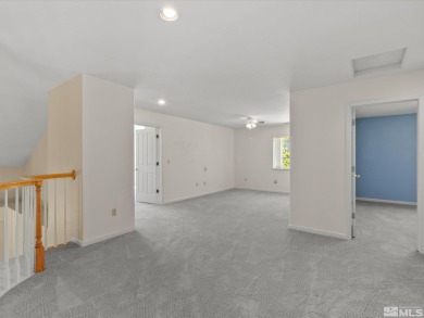 Move-in ready 2,725 sq ft home perched on a beautiful, elevated on LakeRidge Golf Course in Nevada - for sale on GolfHomes.com, golf home, golf lot