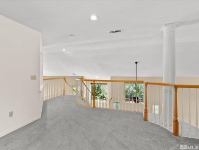 Move-in ready 2,725 sq ft home perched on a beautiful, elevated on LakeRidge Golf Course in Nevada - for sale on GolfHomes.com, golf home, golf lot