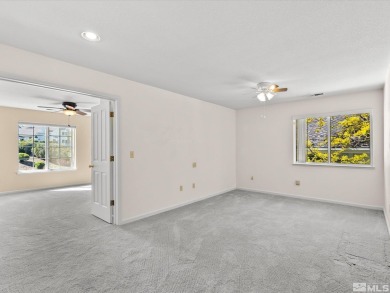Move-in ready 2,725 sq ft home perched on a beautiful, elevated on LakeRidge Golf Course in Nevada - for sale on GolfHomes.com, golf home, golf lot