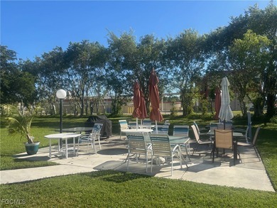 Welcome to this light-filled 2-bedroom, 2-bath end-unit villa in on Myerlee Country Club in Florida - for sale on GolfHomes.com, golf home, golf lot