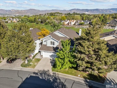 Move-in ready 2,725 sq ft home perched on a beautiful, elevated on LakeRidge Golf Course in Nevada - for sale on GolfHomes.com, golf home, golf lot