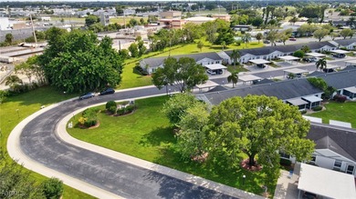 Welcome to this light-filled 2-bedroom, 2-bath end-unit villa in on Myerlee Country Club in Florida - for sale on GolfHomes.com, golf home, golf lot