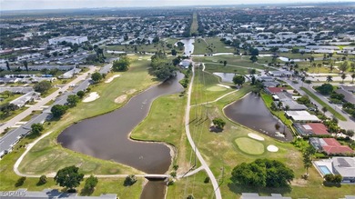 Welcome to this light-filled 2-bedroom, 2-bath end-unit villa in on Myerlee Country Club in Florida - for sale on GolfHomes.com, golf home, golf lot