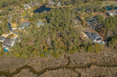 Build your dream home on this beautiful MARSH FRONT lot with on The King and Prince Golf Course, Home of the Hampton Club in Georgia - for sale on GolfHomes.com, golf home, golf lot