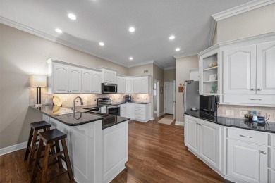 Welcome home to this wonderful reverse villa, a perfect blend of on Falcon Ridge Golf Course in Kansas - for sale on GolfHomes.com, golf home, golf lot
