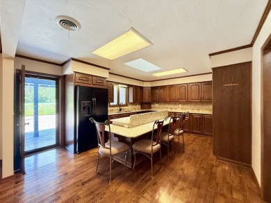 Just the facts, no fancy AI generated adjective heavy on Quarry Stone Golf Club in Kansas - for sale on GolfHomes.com, golf home, golf lot