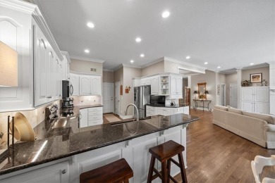 Welcome home to this wonderful reverse villa, a perfect blend of on Falcon Ridge Golf Course in Kansas - for sale on GolfHomes.com, golf home, golf lot