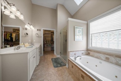 Welcome home to this wonderful reverse villa, a perfect blend of on Falcon Ridge Golf Course in Kansas - for sale on GolfHomes.com, golf home, golf lot