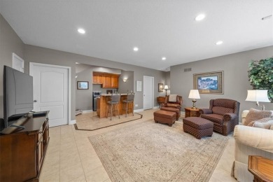 Welcome home to this wonderful reverse villa, a perfect blend of on Falcon Ridge Golf Course in Kansas - for sale on GolfHomes.com, golf home, golf lot