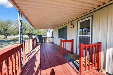 Video walk through available on YouTube! Singlewide on 3 lots on Horseshoe Bend Country Club in Texas - for sale on GolfHomes.com, golf home, golf lot