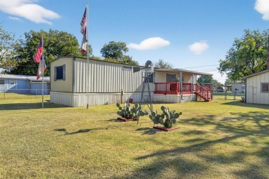 Video walk through available on YouTube! Singlewide on 3 lots on Horseshoe Bend Country Club in Texas - for sale on GolfHomes.com, golf home, golf lot