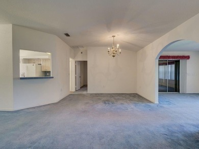 One or more photo(s) has been virtually staged. Live the Florida on Royal Oaks Golf Club in Florida - for sale on GolfHomes.com, golf home, golf lot