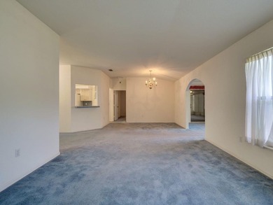 One or more photo(s) has been virtually staged. Live the Florida on Royal Oaks Golf Club in Florida - for sale on GolfHomes.com, golf home, golf lot