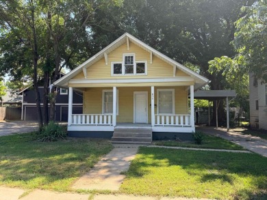 Enjoy this Riverside bungalow, walking distance to Riverside on Arthur B. Sim Park Golf Course in Kansas - for sale on GolfHomes.com, golf home, golf lot