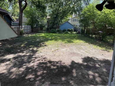 Enjoy this Riverside bungalow, walking distance to Riverside on Arthur B. Sim Park Golf Course in Kansas - for sale on GolfHomes.com, golf home, golf lot