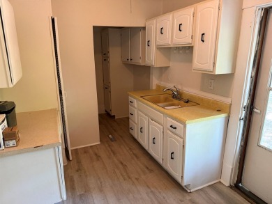 Enjoy this Riverside bungalow, walking distance to Riverside on Arthur B. Sim Park Golf Course in Kansas - for sale on GolfHomes.com, golf home, golf lot