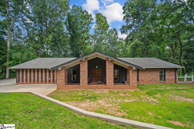 Welcome to 106 E Lewis Road -- a stunning Mid-Century Modern on The Walker Golf Course At Clemson University in South Carolina - for sale on GolfHomes.com, golf home, golf lot