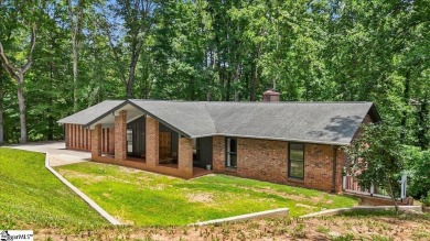 Welcome to 106 E Lewis Road -- a stunning Mid-Century Modern on The Walker Golf Course At Clemson University in South Carolina - for sale on GolfHomes.com, golf home, golf lot