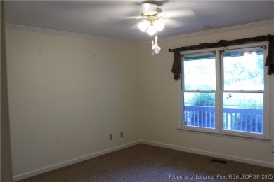 Welcome to this 2-bedroom, 2-bathroom townhome located right on on Kings Grant Golf and Country Club in North Carolina - for sale on GolfHomes.com, golf home, golf lot
