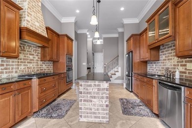 Enjoy serene water and golf course views from this exceptional on Oak Harbor Golf Club in Louisiana - for sale on GolfHomes.com, golf home, golf lot