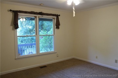 Welcome to this 2-bedroom, 2-bathroom townhome located right on on Kings Grant Golf and Country Club in North Carolina - for sale on GolfHomes.com, golf home, golf lot