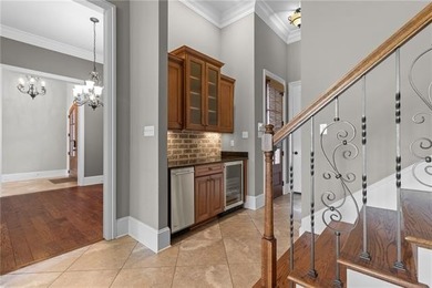 Enjoy serene water and golf course views from this exceptional on Oak Harbor Golf Club in Louisiana - for sale on GolfHomes.com, golf home, golf lot