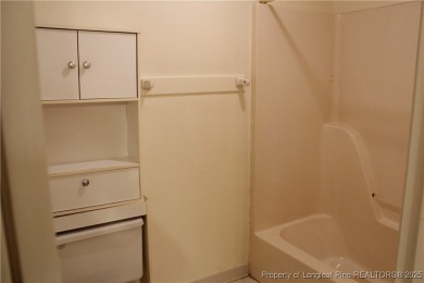Welcome to this 2-bedroom, 2-bathroom townhome located right on on Kings Grant Golf and Country Club in North Carolina - for sale on GolfHomes.com, golf home, golf lot