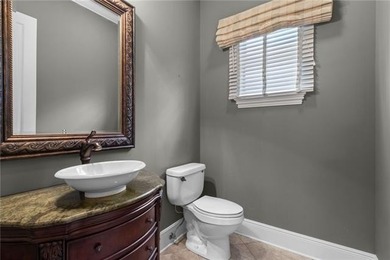 Enjoy serene water and golf course views from this exceptional on Oak Harbor Golf Club in Louisiana - for sale on GolfHomes.com, golf home, golf lot