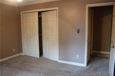 Welcome to this 2-bedroom, 2-bathroom townhome located right on on Kings Grant Golf and Country Club in North Carolina - for sale on GolfHomes.com, golf home, golf lot