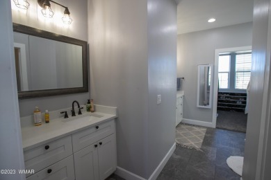 Gorgeous custom 6 bedroom 4.5 bathroom home in Frontier Estates on Snowflake Municipal Golf Course in Arizona - for sale on GolfHomes.com, golf home, golf lot