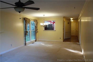 Welcome to this 2-bedroom, 2-bathroom townhome located right on on Kings Grant Golf and Country Club in North Carolina - for sale on GolfHomes.com, golf home, golf lot