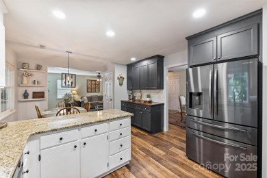 Pride of Ownership in Raintree with Long View of Golf Course! on Raintree Country Club in North Carolina - for sale on GolfHomes.com, golf home, golf lot