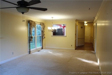 Welcome to this 2-bedroom, 2-bathroom townhome located right on on Kings Grant Golf and Country Club in North Carolina - for sale on GolfHomes.com, golf home, golf lot