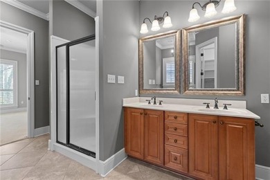 Enjoy serene water and golf course views from this exceptional on Oak Harbor Golf Club in Louisiana - for sale on GolfHomes.com, golf home, golf lot