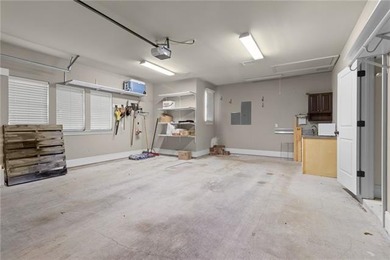 Enjoy serene water and golf course views from this exceptional on Oak Harbor Golf Club in Louisiana - for sale on GolfHomes.com, golf home, golf lot